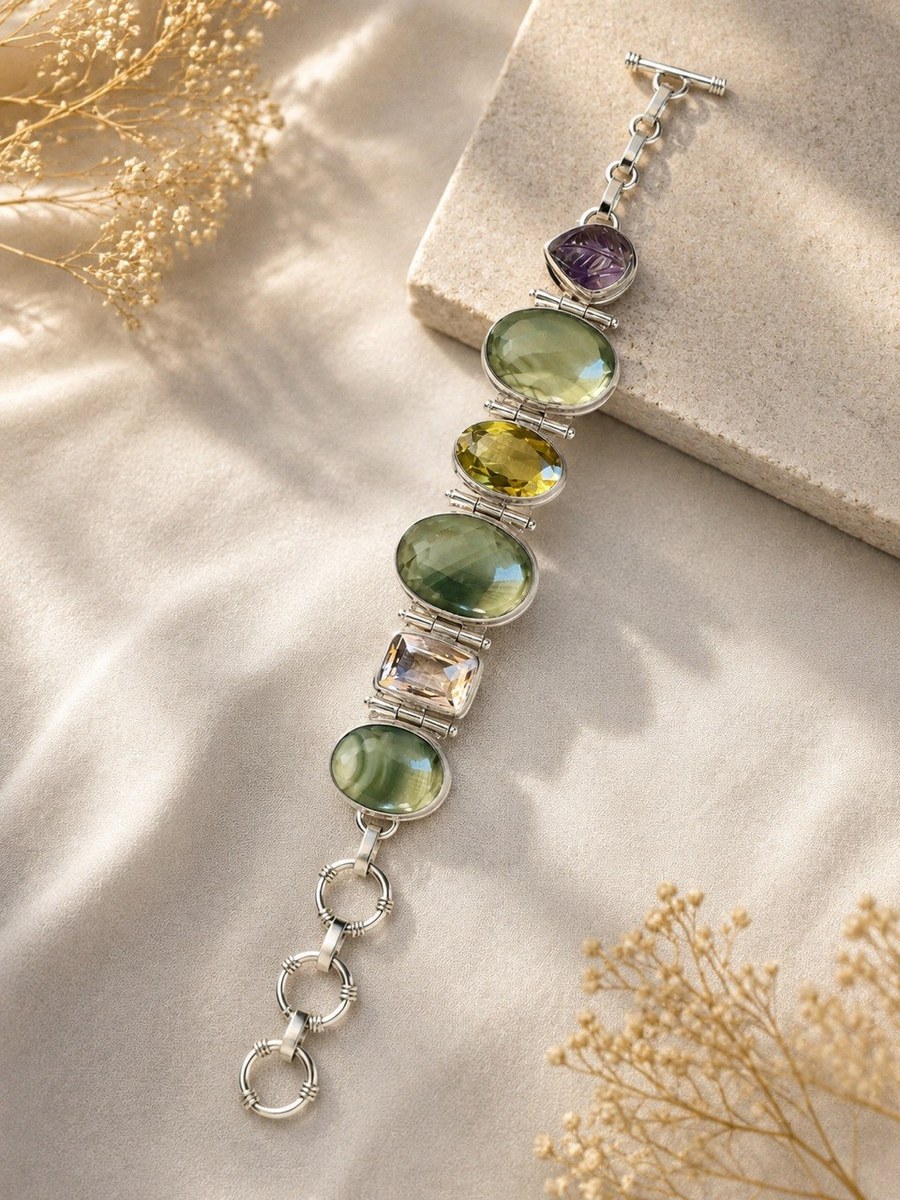 Handcrafted sterling silver bracelet set with green, gold and amethyst natural gemstones in cabochon and faceted cuts