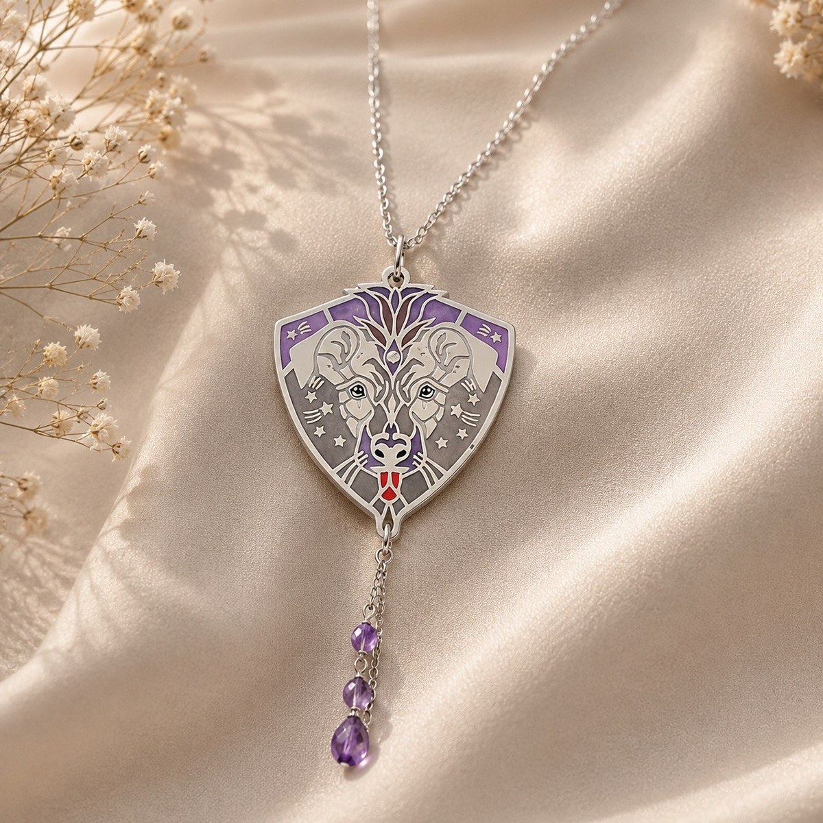 Sterling silver shield pendant with an enamelled celestial Dog design, white gemstone and a drop of three natural amethysts