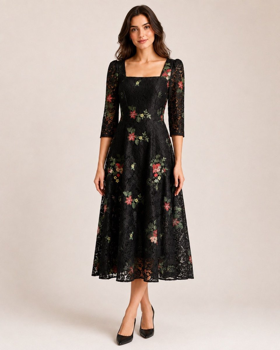 Black lace midi dress with red, pink and green floral embroidery, square neckline and three-quarter sleeves, front view